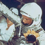 Astronaut John Glenn Helped into Capsule by NASA Techncians