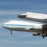 Space Shuttle Orbiter Piggybacked to Airplane for Transport